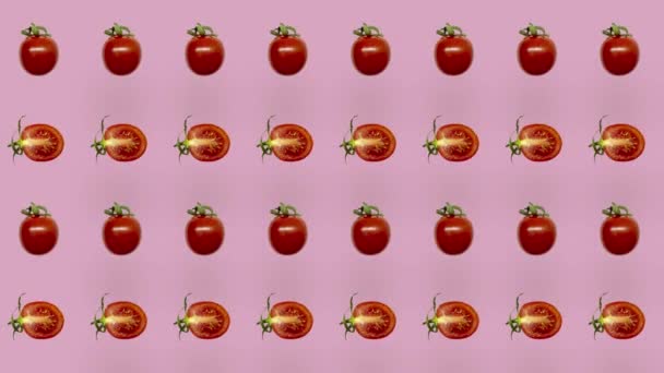 Buntes Muster frischer roter Tomaten auf rosa Hintergrund. Nahtloses Muster mit Kirschtomaten. Realistische Animation. 4K-Videobewegung — Stockvideo