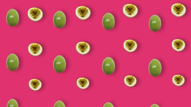 Colorful fruit pattern of fresh passion fruit on pink background with shadows. Seamless pattern with passion fruit. Realistic animation. 4K video motion — Stock Video