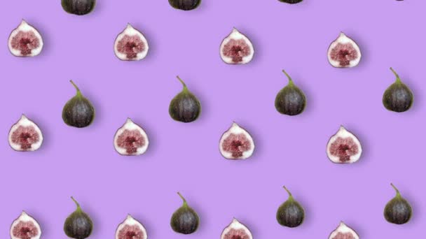 Színes gyümölcs minta friss füge lila háttér árnyékok. Zökkenőmentes minta felvágott fügével. Reális animáció. 4K videó mozgás — Stock videók