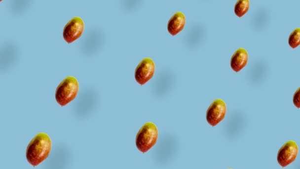 Colorful fruit pattern of fresh mango on blue background with shadows. Seamless pattern with mango. Realistic animation. 4K video motion — Stockvideo