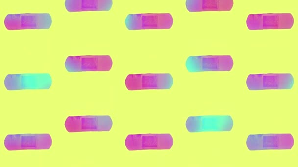 Adhesive plasters pattern in vibrant gradient holographic neon colors. Concept art. Minimal surrealism background. Seamless pattern with plaster. Realistic animation. 4K video motion — Vídeo de Stock