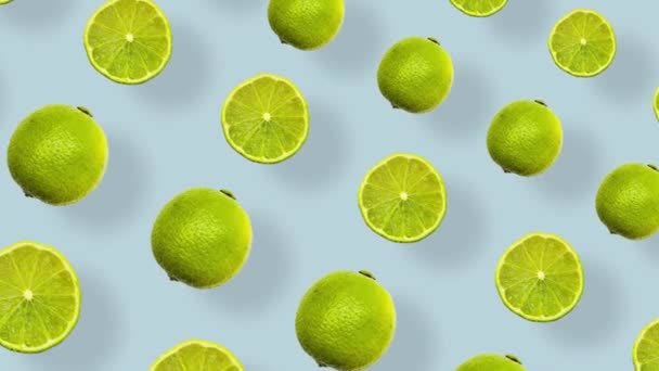 Colorful fruit pattern of fresh limes on blue background with shadows. Seamless pattern with lime. Realistic animation. 4K video motion — Video Stock