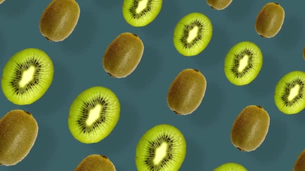 Colorful fruit pattern of fresh kiwi on green background with shadows. Seamless pattern with kiwi sliced. Realistic animation. 4K video motion — Stockvideo