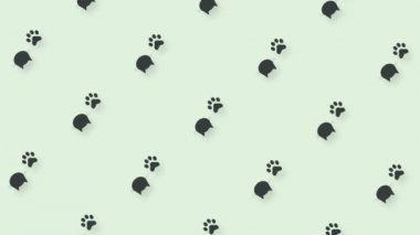 Siyah kedi başları ve pençelerinin renkli deseni. Kedi pençesi ve yüzleri olan kusursuz bir desen. Hayvan silueti. 4K video hareketi