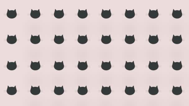 Patrón colorido de cabezas de gato negro sobre fondo rosa. Patrón sin costuras con caras de gato. Vista superior. Silueta animal. Movimiento de vídeo 4K — Vídeo de stock