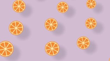 Pastel pembe arka planda gölgeli turuncu dilimlerin renkli meyve deseni. Turuncu ile kusursuz desen. Üst Manzara. 4K video hareketi