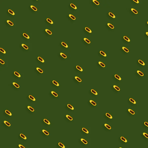 Colorful fruit pattern of fresh papaya on green background. Top view. Flat lay. Pop art design — Stock Photo, Image