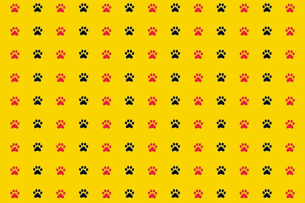 노란색 배경에는 검정 색 과 분홍색 고양이 발의 화려 한 무늬가 있다. 고양이 발에 물기 없는 무늬. 개, 고양이 발자국 — 스톡 사진