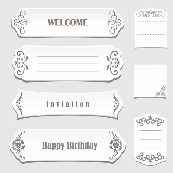 White paper banners with calligraphic elements. — Stock Vector