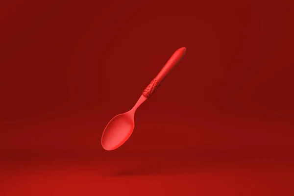 Cucchiaio Rosso Galleggiante Sfondo Rosso Idea Concetto Minimale Creativo Monocromatico — Foto Stock