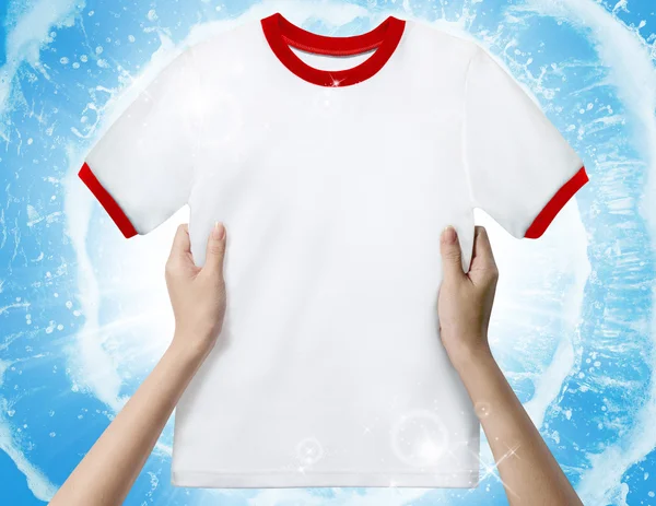 Hand hold White shirt — Stock Photo, Image