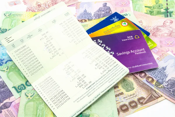 Thailand banknotes and Account Passbook — Stock Photo, Image