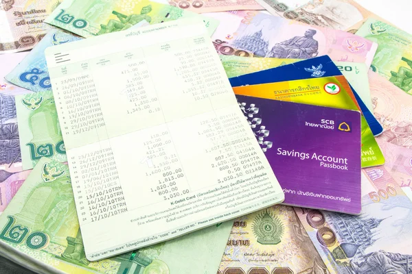 Thailand banknotes and Account Passbook — Stock Photo, Image