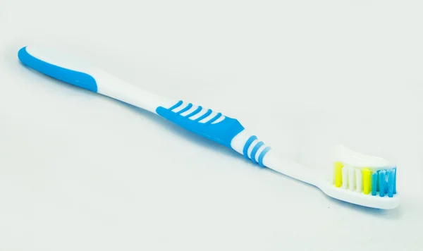 Toothbrush with toothpaste isolated — Stock Photo, Image