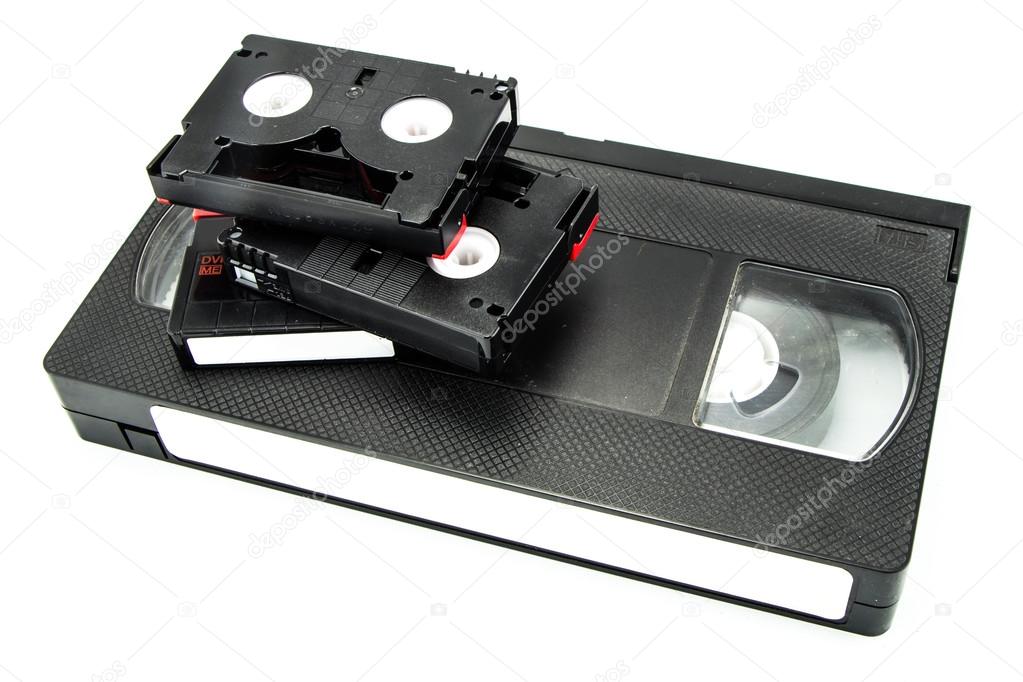 Group of mini dv and video tape isolated on white