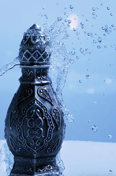 Arabian Oud Bottle Under Shower — Stock Photo, Image