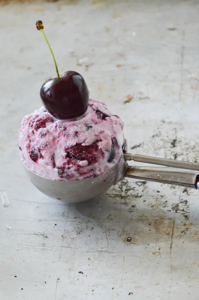 Fruit ice cream with cherry