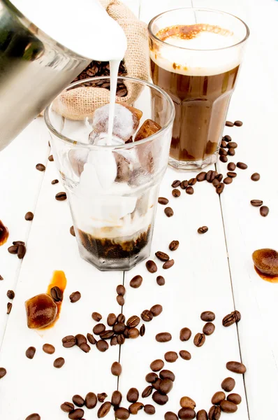 Cube in a glass of iced coffee. — Stock Photo, Image