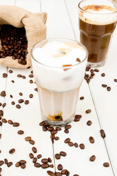 Cube in a glass of iced coffee. — Stock Photo, Image