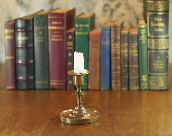 Candle in candlestick — Stock Photo, Image