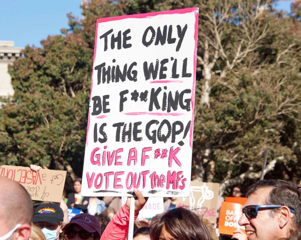 San Francisco, CA - May 3, 2022: Participants at Womens Rights Protest after SCOTUS leak, plan to overturn Roe v Wade. Holding signs protesting the leaked plan to overturn Roe v Wade.