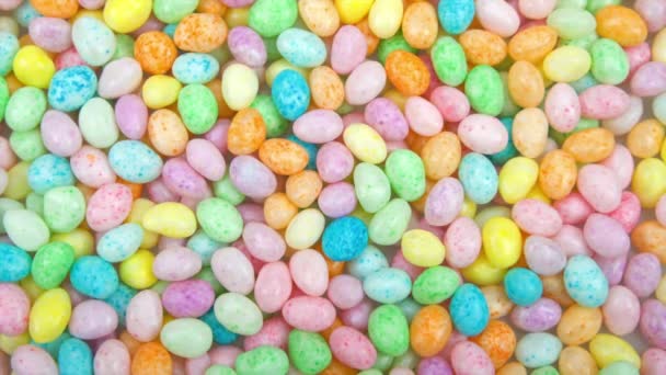 Video Inzoomen Achtergrond Van Kleurrijke Snoep Jelly Beans Vlakke Ondergrond — Stockvideo