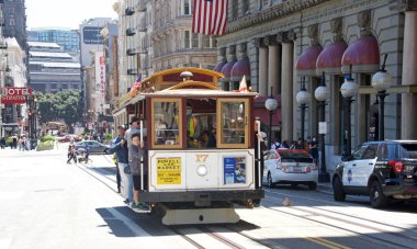 San Francisco, CA - July 17, 2022: Historic iconic trolley cars at Powell and Market street. Traveling on Powell Street to and from Fisherman's wharf.