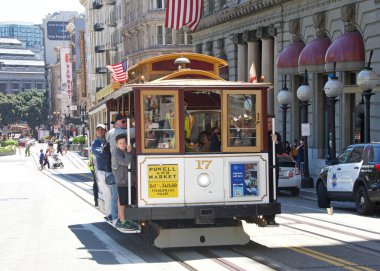 San Francisco, CA - July 17, 2022: Historic iconic trolley cars at Powell and Market street. Traveling on Powell Street to and from Fisherman's wharf.