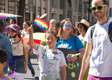 Oakland, CA - Sept 4, 2022:  Unidentified participants celebrate at the Oakland Gay Pride Parade on Broadway, downtown Oakland. Back to in person celebrations post covid pandemic restrictions.