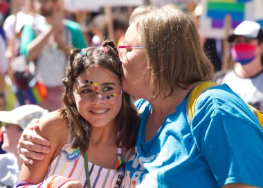 Oakland, CA - Sept 4, 2022:  Unidentified participants celebrate at the Oakland Gay Pride Parade on Broadway, downtown Oakland. Back to in person celebrations post covid pandemic restrictions.