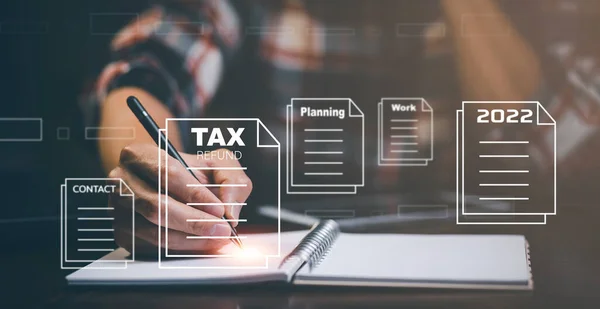 2022年計画概念義務課税ビジネスの税還付と還付のためのバー税のノートを使用してマンハンドペン グラフやチャートは 画面メディア タブレット上で実証され 税還付を選択 — ストック写真