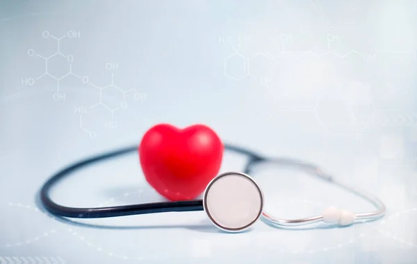 Concept stethoscope and red heart with Health insurance, doctor stethoscope and red heart check heart health care, instrument for checking heart on the white background represents exercise, isolated