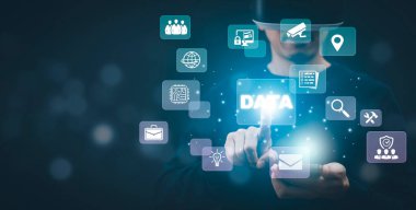 Man Wearing VR glasses virtual with Analytics and Data Management System on the computer, Hands working on a laptop cloud network graphic overlay, connected to the database. Corporate strategy 
