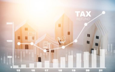 Concept tax payment optimisation business finance, wooden home  with taxes icon on technology screen, income tax and property, business individuals and corporations such as VAT