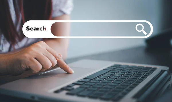 Searching Browsing Internet Data Information with blank search bar. man\'s hands are using smartphone and keyboard to Searching for information. Using Search Console with your website.