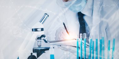 Virüs için mikroskopla çalışan biyokimya araştırmacısı Doktor Man, laboratuvar camlarında tasarım için kimyasal sıvı içeren deneysel sonuçların tarihçesini yazdı..