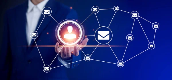 Businessman hold people with communication icons, letter icon, email icons, and newsletter email and protect your personal information or spam mail, Customer service call center contact.