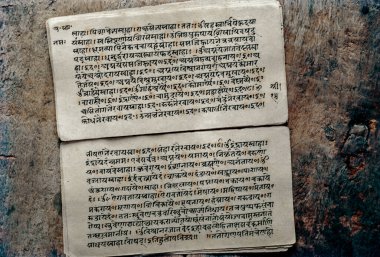 03 29 2020 Old Hand written Hindu scriptures in Sanskrit text Studio shot Lokgram Kalyan Maharashtra India. clipart