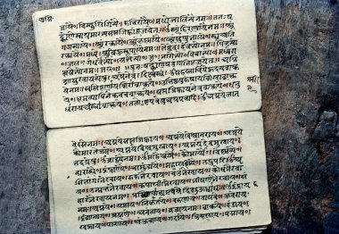 03 29 2020 Old Hand written Hindu scriptures in Sanskrit text Studio shot Lokgram Kalyan Maharashtra India. clipart