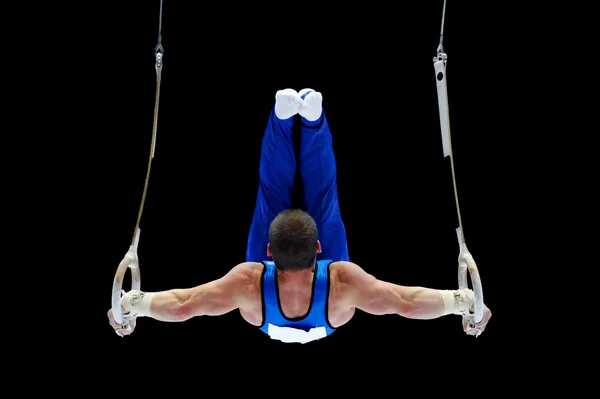 Gymnast Performing On The Rings — Stock Photo, Image