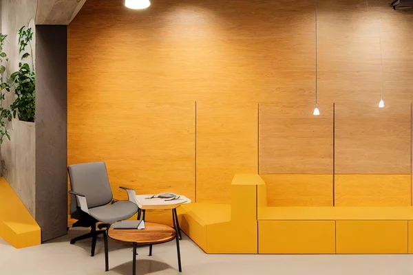 Sunny open space office with light grey furniture, wooden wall and concrete floor. Eco style interior concept