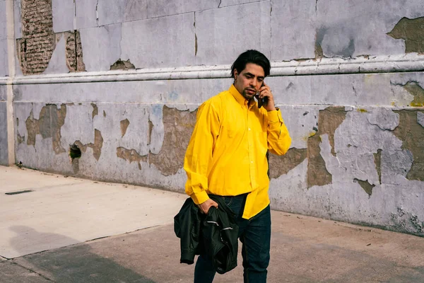 Portrait Handsome Latin Young Man Yellow Shirt Talking Phone Street — Stock Fotó