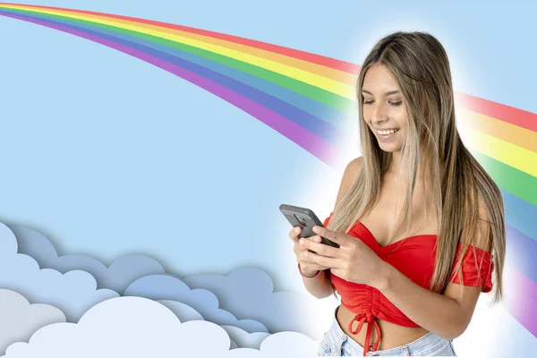 A Latina woman with her happy cell phone with rainbow drawn background and big space for text. Digital marketing concept