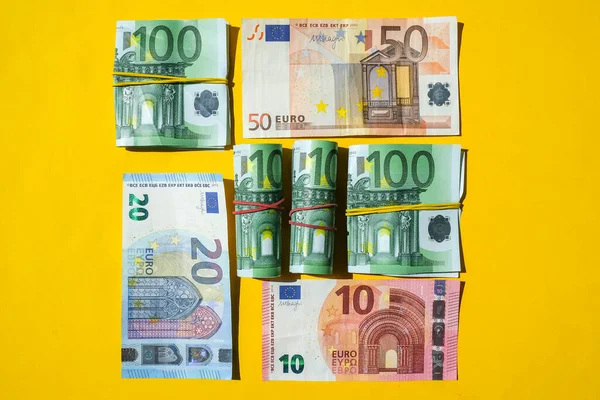 Euro bills are creative layout. Business concept, development perspective. Flat lay. Top view. Minimal creative style pattern. Business budget of wealth and prosperity finance.