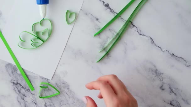 Diy St. Patricks Day greeting card made of Quilling and paper clovers on white background. Gift idea, decor Spring, happy Patrick Day. Step by step. — Stock Video