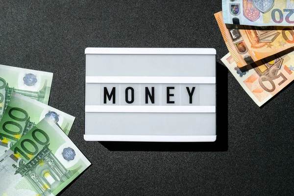 Lightbox Board Word Money Black Letters Euro Banknotes Finance Background — Stock Photo, Image