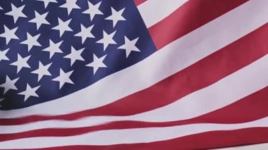 Ağır çekim dalgalanan Amerikan Bayrağı Arkaplanı. Amerika Birleşik Devletleri bayrağı. 4 Temmuz Bağımsızlık Günü. Amerikan vatanseverliği ulusal bayramı. Usa gurur duyuyor.