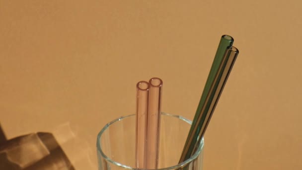 Reusable Glass Straws Glass Water Beige Neutral Background Eco Friendly — Stock Video