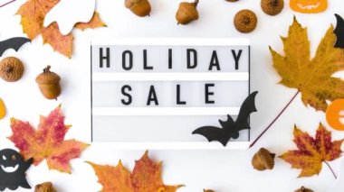4k zoom in out Lightbox with text HOLIDAY SALE, Halloween autumn leaves decorations Sale shopping concept. Online shopping Template Black friday sale mockup fall thanksgiving promotion advertising Big