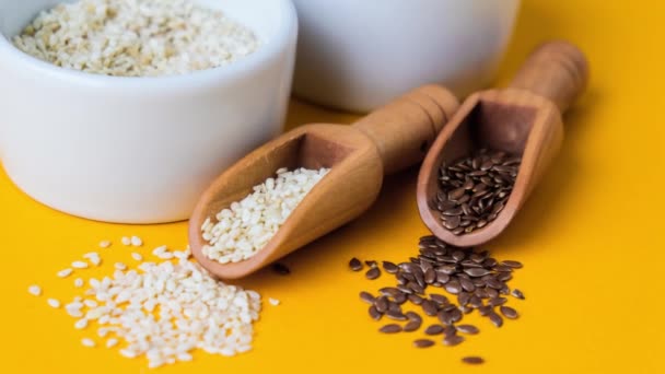 Zoom Out Wooden Spoons Sesame Flax Seeds Lies White Mortar — Wideo stockowe